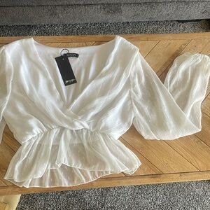 Sheer white cropped long-sleeve